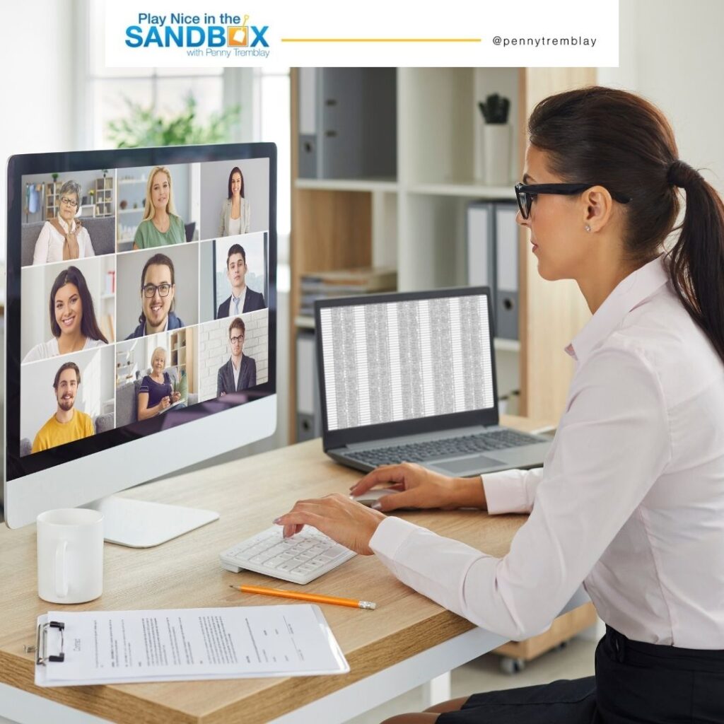 image of woman on computer doing a check in on goals with her team