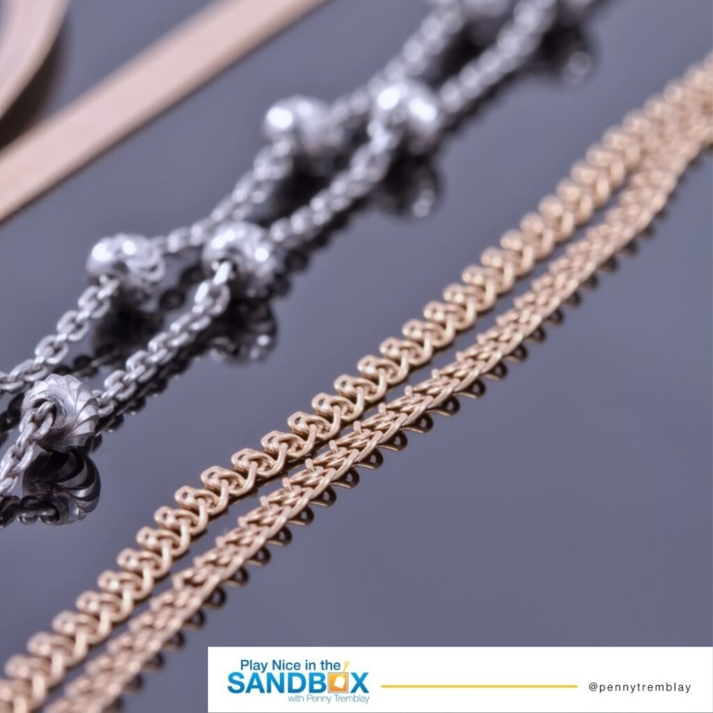 image of necklaces that were entangled in conflict