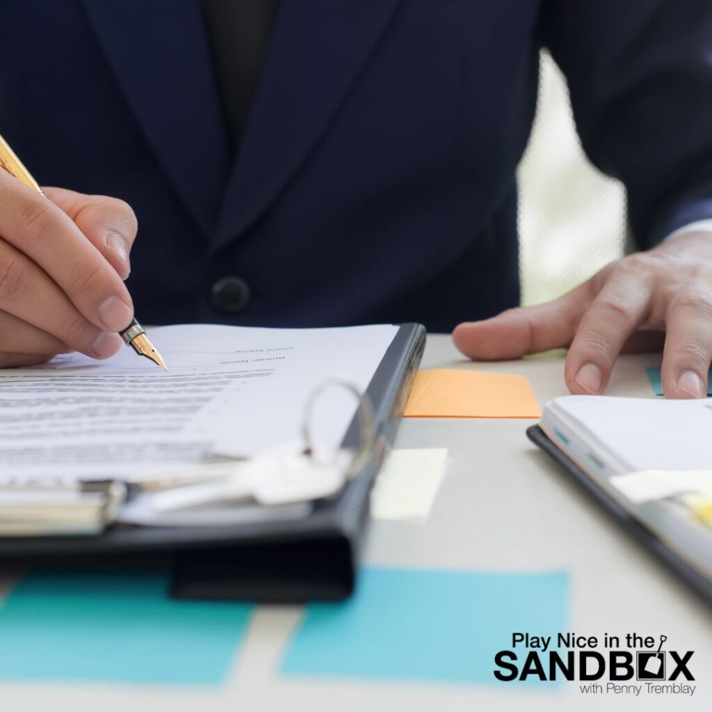 image of a person writing on a paper at a desk with a fountain pen to show Aligning Workplace Policies with Multi-Generational Needs
