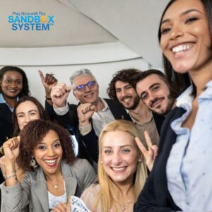 image of several multi generational coworkers smiling together to show The Problem with Gen Z.