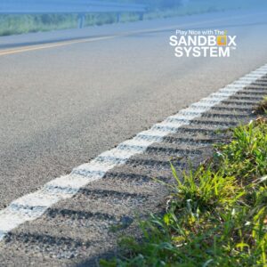image of a roadway with Guard Rails and Rumble Strips